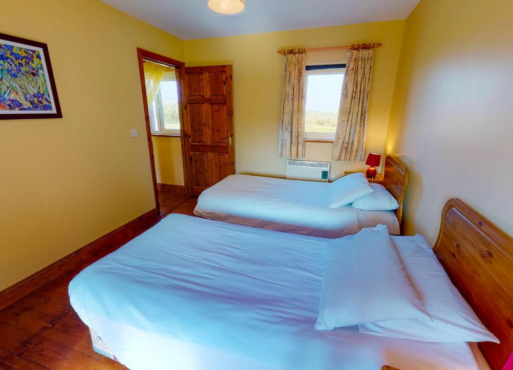 Voodi või voodid majutusasutuse Seacliff Holiday Homes No 8 by Trident Holiday Homes toas