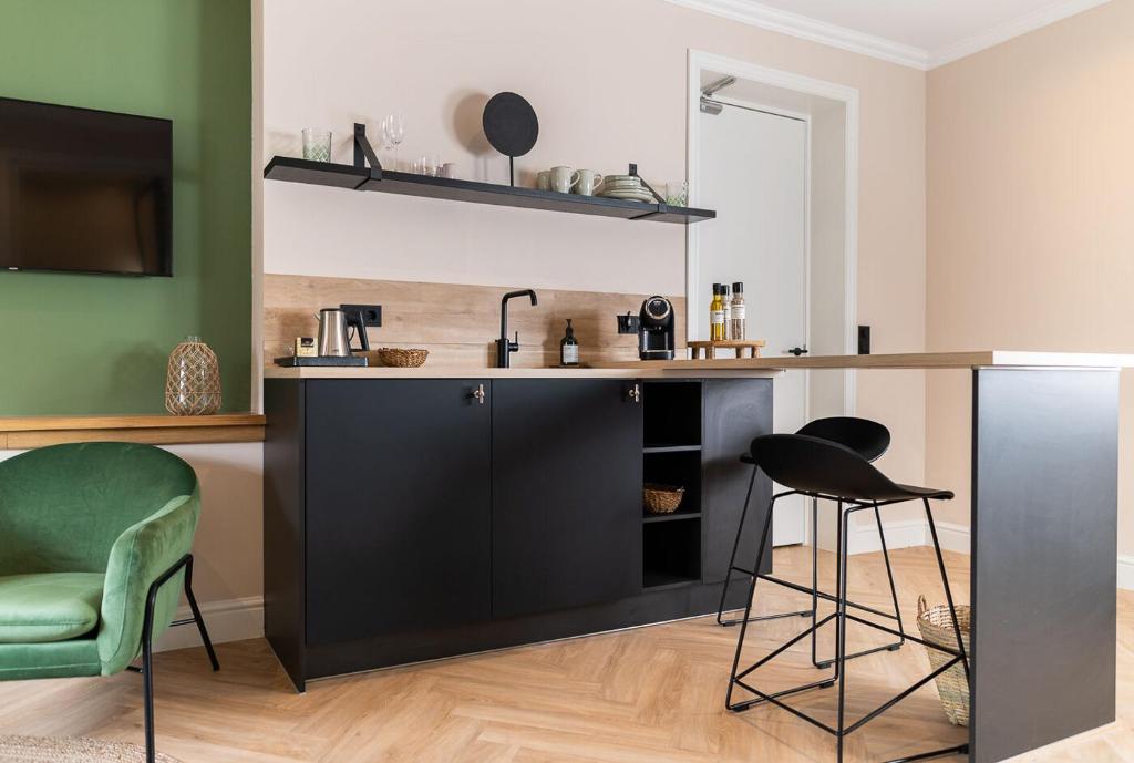 Kuchyň nebo kuchyňský kout v ubytování Bed en Baguette