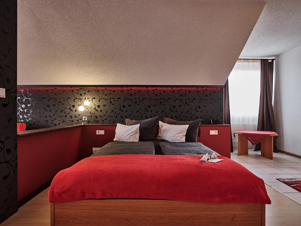 Postel nebo postele na pokoji v ubytování TIPTOP Hotel am Hochrhein