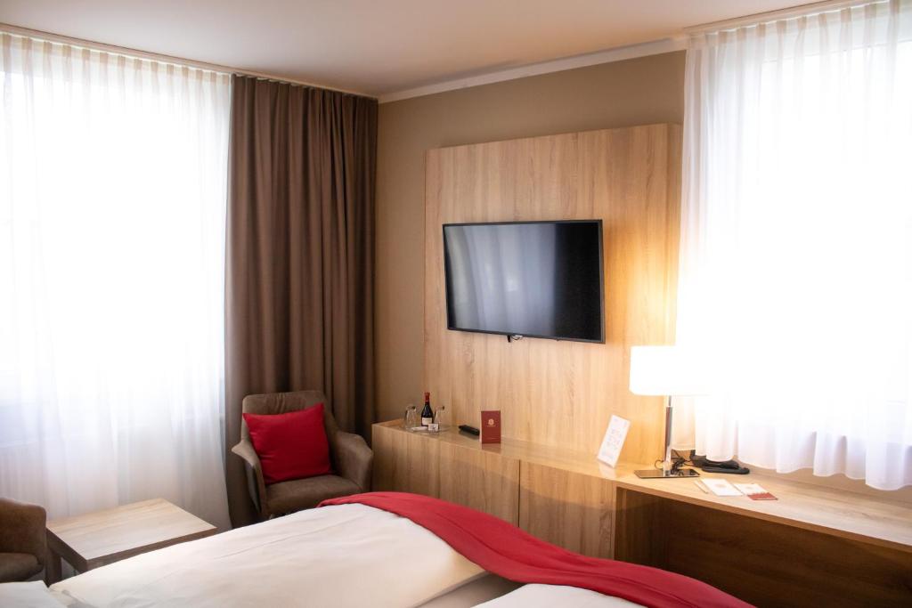 TV a/nebo společenská místnost v ubytování Schloss Breitenfeld Hotel & Tagung