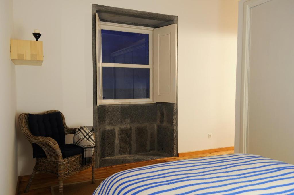 Postel nebo postele na pokoji v ubytování Casa do Baleeiro