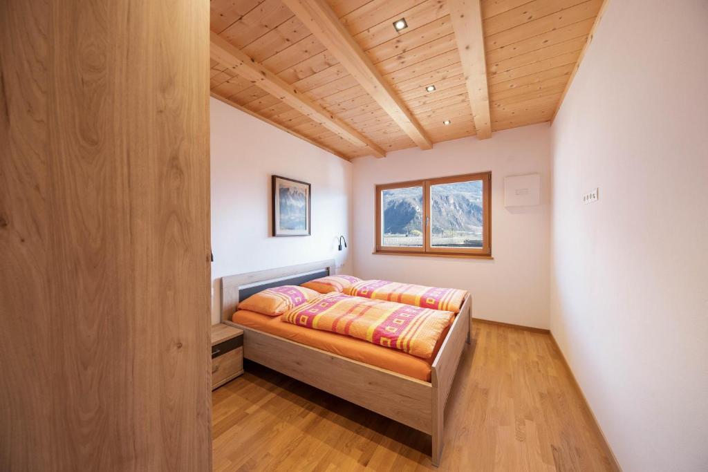 Letto o letti in una camera di Ferienwohnung 2 Weger