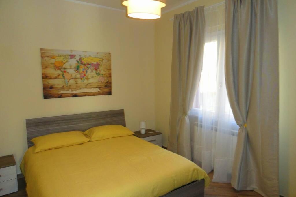 A bed or beds in a room at CASA CANTONIERA-GUEST HOUSE : COSTRUITE IL VIAGGIO