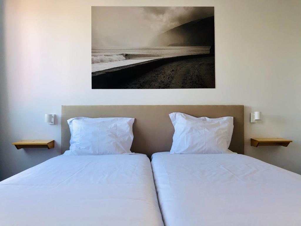 Postel nebo postele na pokoji v ubytování Madeira Surf Camp