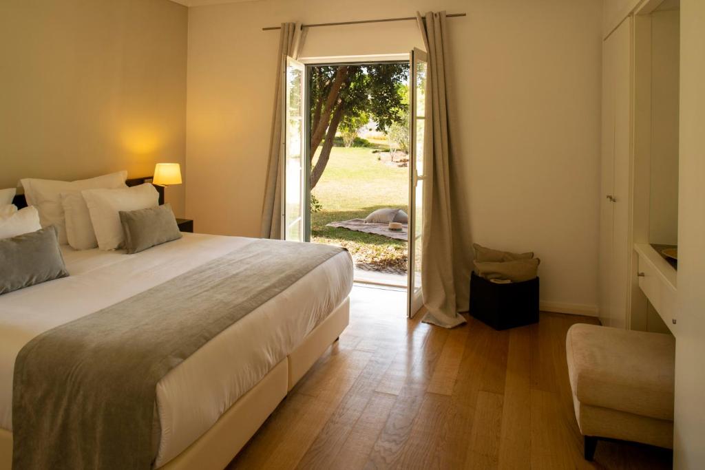 Postel nebo postele na pokoji v ubytování Vila Bicuda Resort