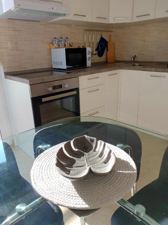Kuchyňa alebo kuchynka v ubytovaní Apartman Alisa