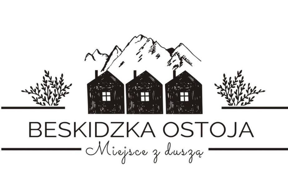 un logotipo para un pueblo en las montañas en Beskidzka Ostoja - Miejsce z duszą, en Ustroń