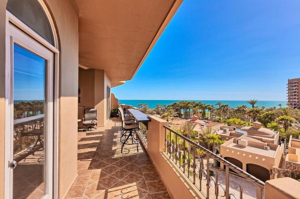 a balcony with a view of the ocean at Bella Sirena 305-A Luxury Condo in Puerto Peñasco