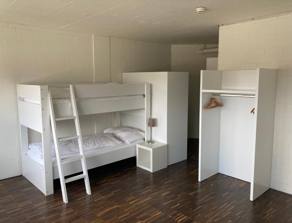 Una cama o camas en una habitación de Omnium Sport Hotel