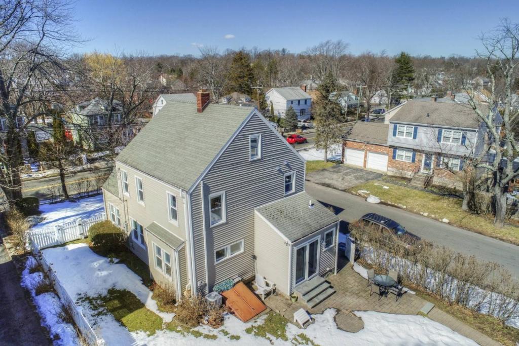 an aerial view of a house in a neighborhood at Belltown Retreat in Stamford