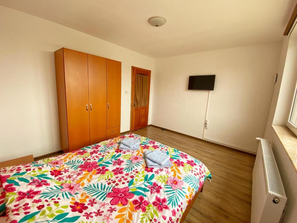 Postel nebo postele na pokoji v ubytování Vila Nei