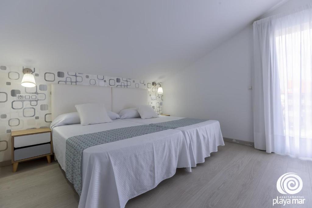 Postel nebo postele na pokoji v ubytování Apartamentos Turísticos Playa Mar I