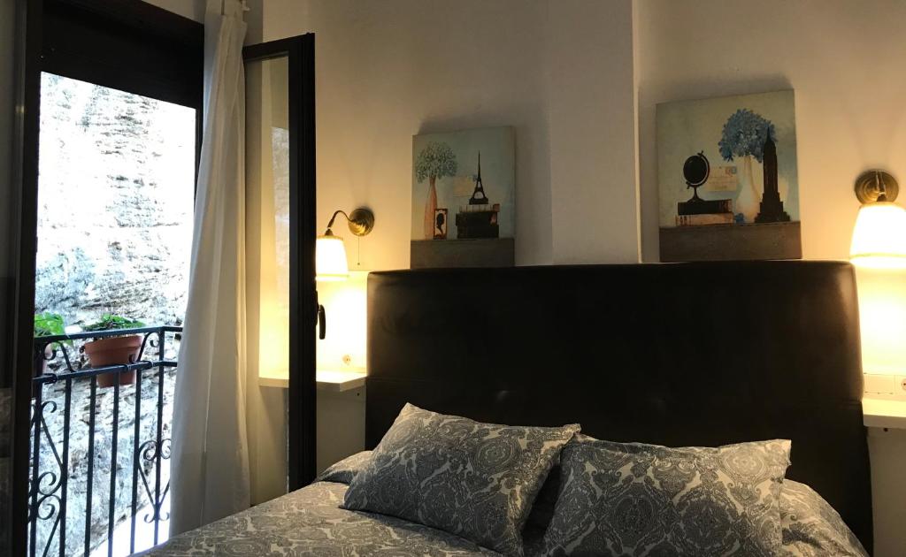 Cama o camas de una habitación en Casa Bajo la Roca
