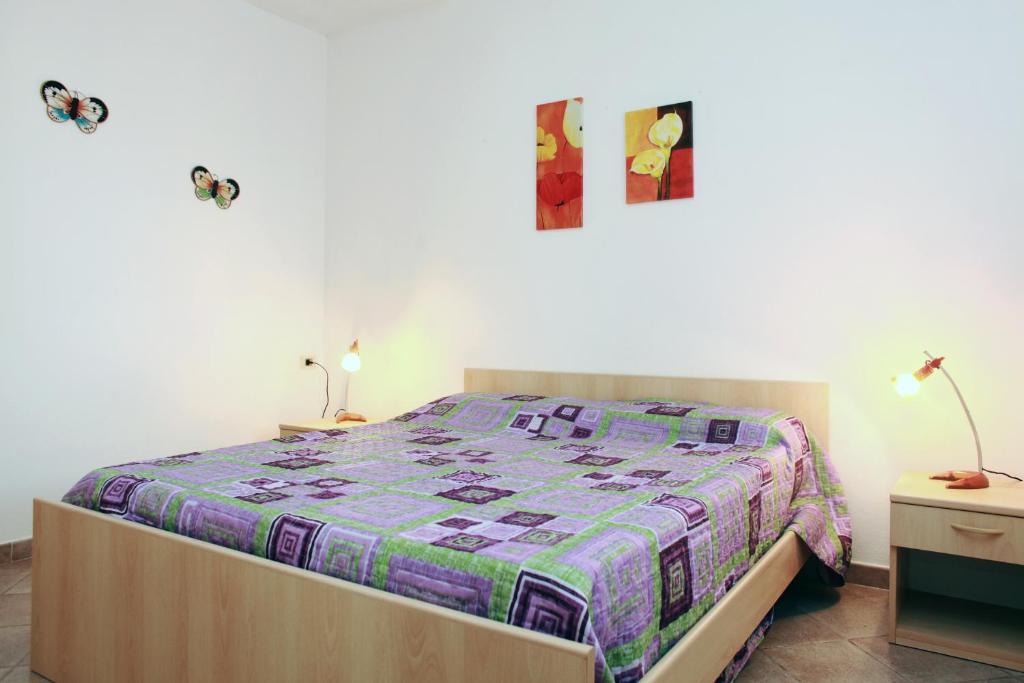 Postel nebo postele na pokoji v ubytování Appartamenti Ideal