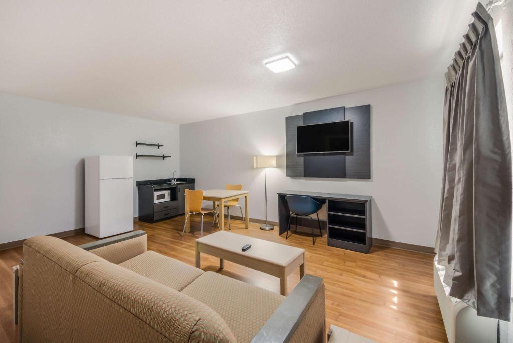 a living room with a couch and a table at Studio 6 Laredo, Tx - North I-35 in Laredo