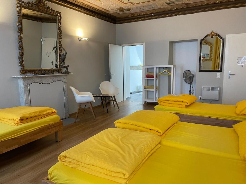 A bed or beds in a room at Pardo Bar