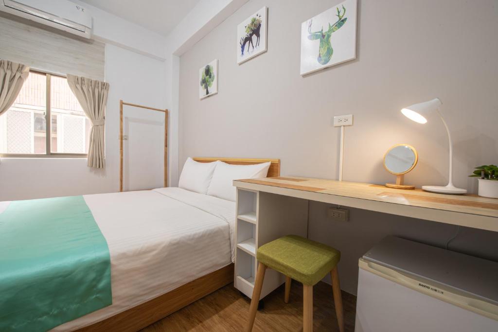 Postel nebo postele na pokoji v ubytování No Smoking INN
