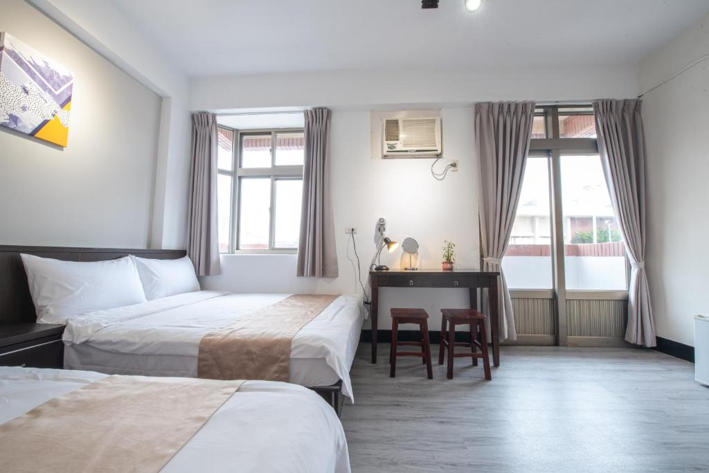 Postel nebo postele na pokoji v ubytování No Smoking INN