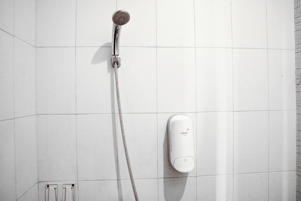 Koupelna v ubytování Audah Syariah Residence Mitra RedDoorz