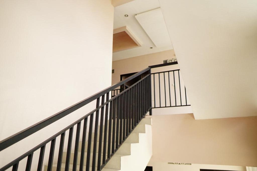 Fotografie z fotogalerie ubytování Audah Syariah Residence Mitra RedDoorz v destinaci Surabaja