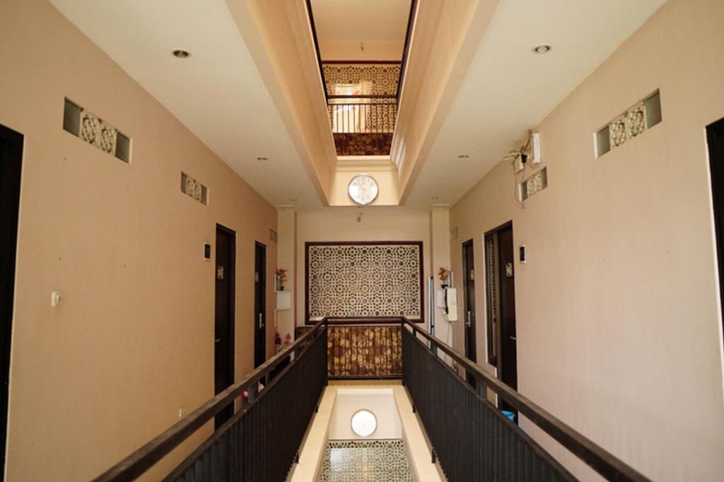 Fotografie z fotogalerie ubytování Audah Syariah Residence Mitra RedDoorz v destinaci Surabaja