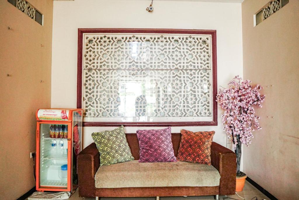 Posezení v ubytování Audah Syariah Residence Mitra RedDoorz