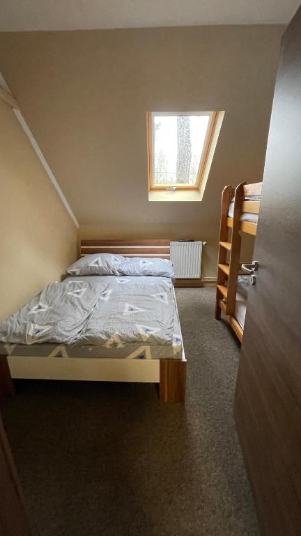 Postel nebo postele na pokoji v ubytování Grátisz Apartman Siófok