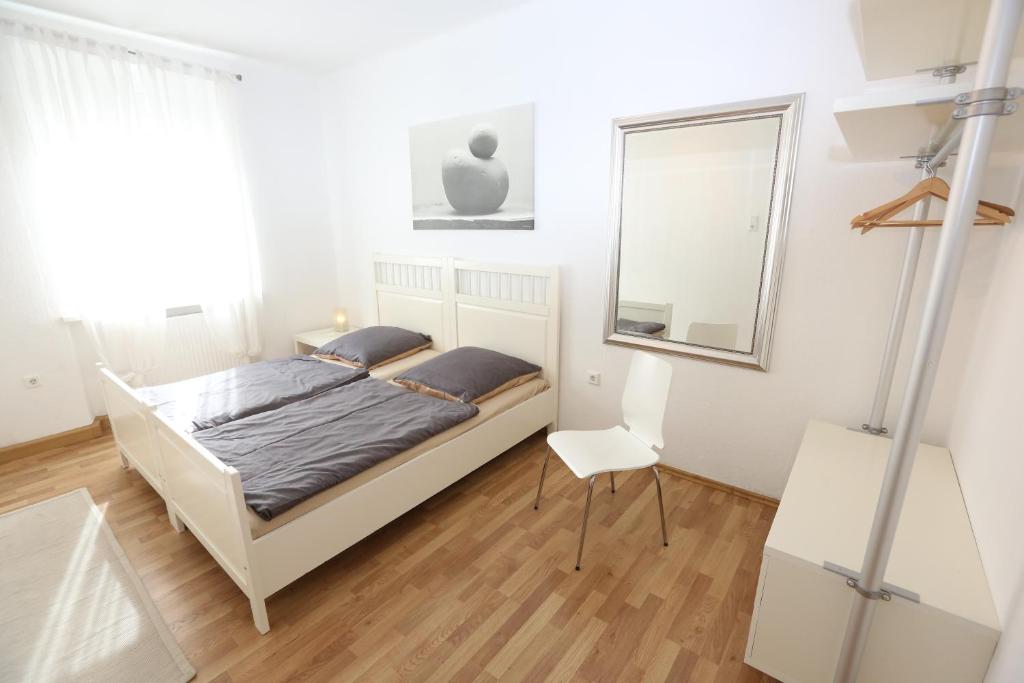 Cama o camas de una habitación en Apartments Thommen