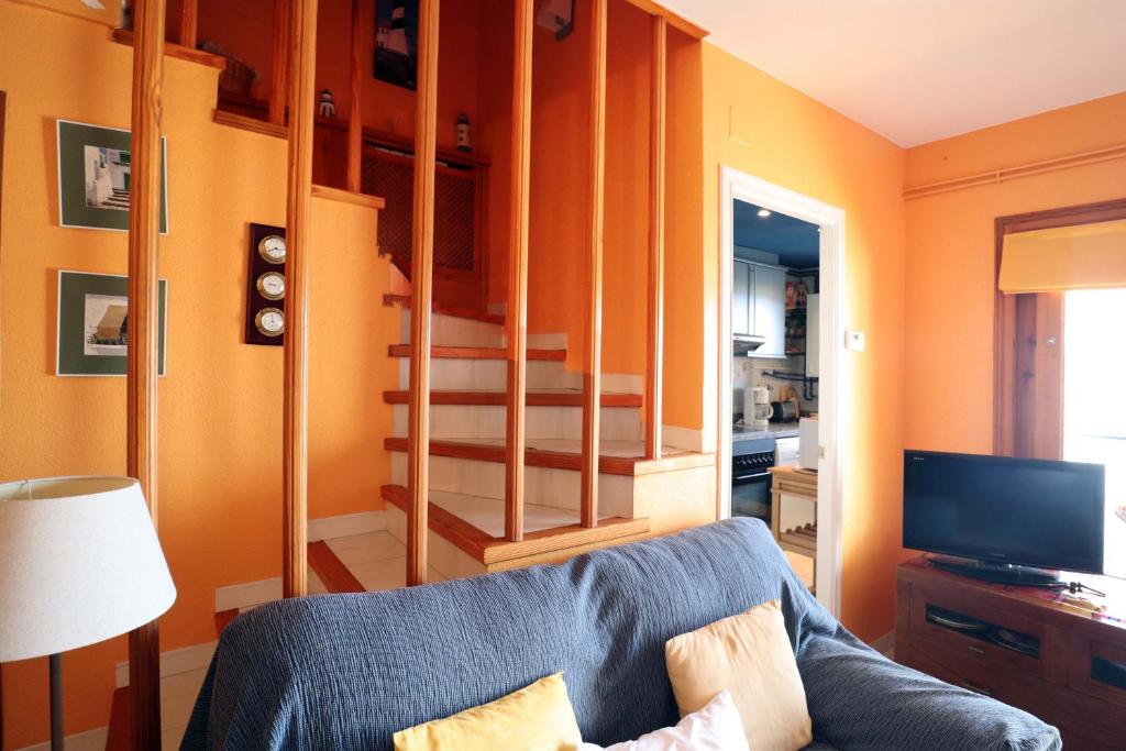 TV a/nebo společenská místnost v ubytování Jardins de S'agaro per 6 pax, piscina comunitaria y parking E32235