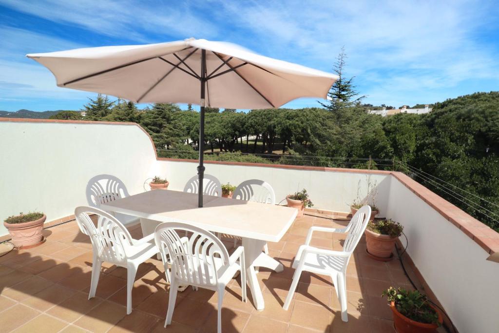 Balkón nebo terasa v ubytování Jardins de S'agaro per 6 pax, piscina comunitaria y parking E32235