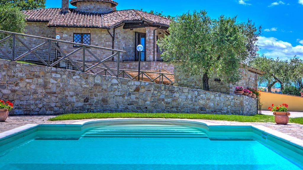The swimming pool at or close to COLLE DEL SOLE 7&1, Emma Villas