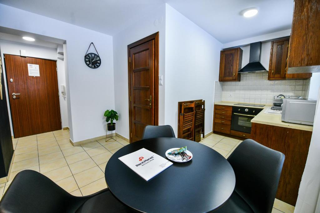 Kuchyňa alebo kuchynka v ubytovaní RentPlanet - Apartamenty Bulwary Słowackiego