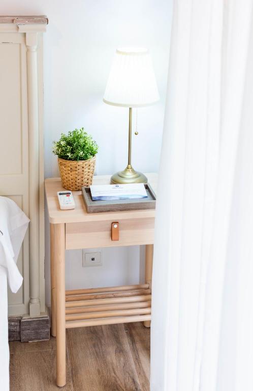 Posteľ alebo postele v izbe v ubytovaní Apartamentos Toboso Plaza