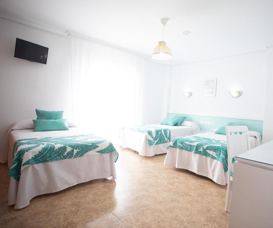 Posteľ alebo postele v izbe v ubytovaní Hotel Blanca Brisa Cabo de Gata