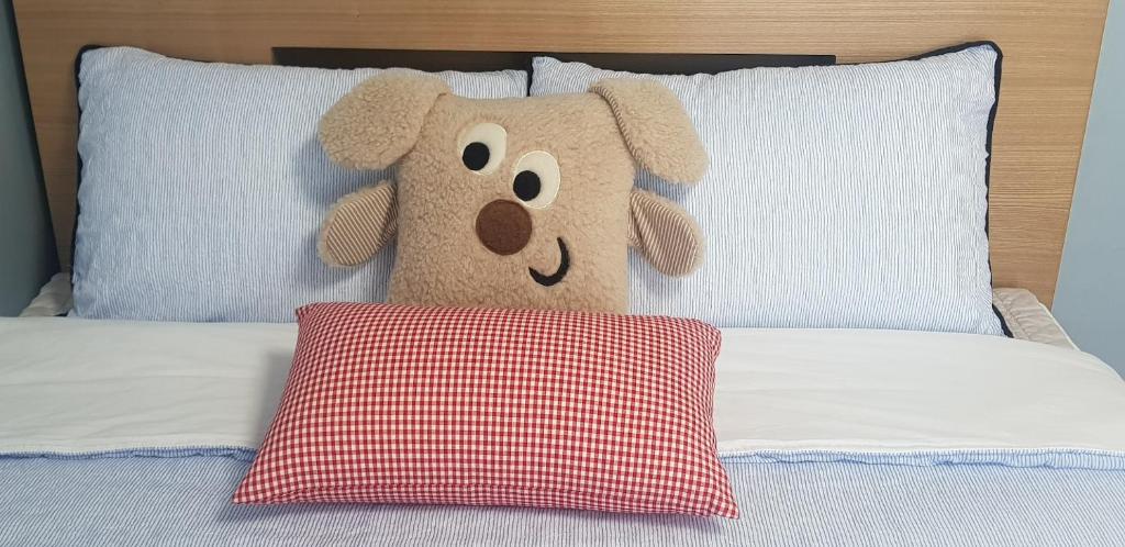 Postel nebo postele na pokoji v ubytování Naksanstay