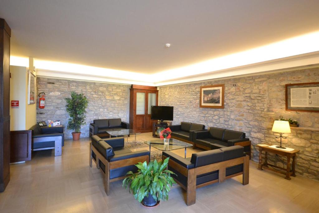 Uma TV ou centro de entretenimento em Hotel Il Castello