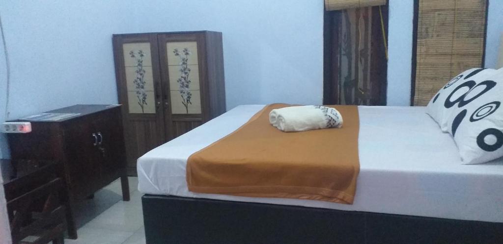 Postel nebo postele na pokoji v ubytování D'corner Homestay