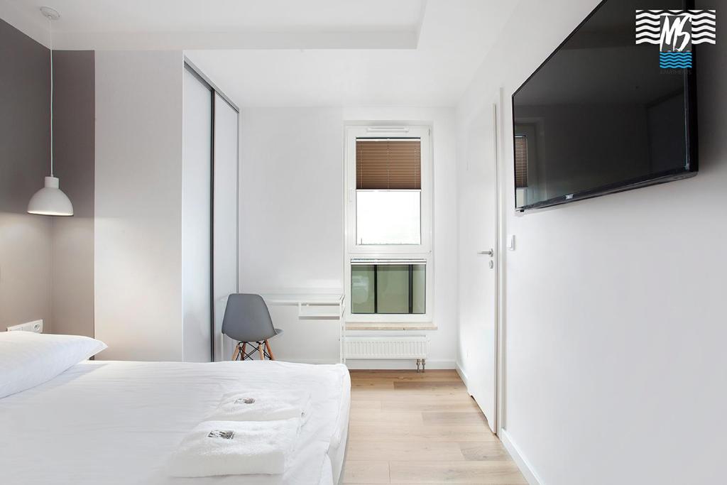 Posteľ alebo postele v izbe v ubytovaní MS Apartments Sky Tower VI