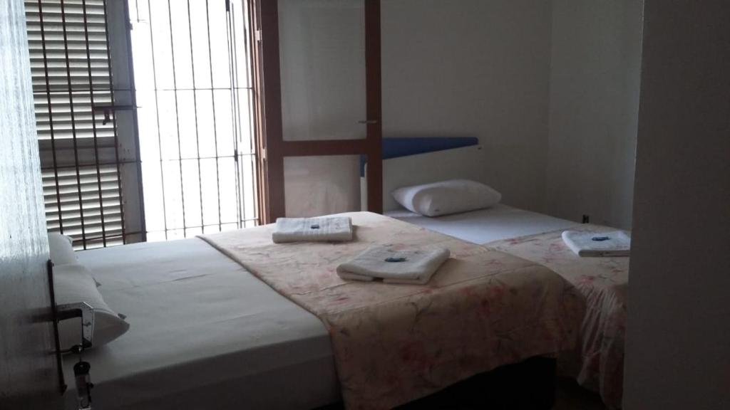  Casa com churrasqueira para 15 pessoas a 30mt do Aquário de Ubatuba