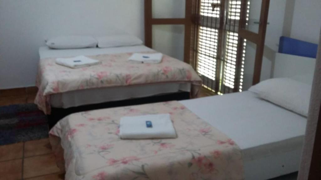  Casa com churrasqueira para 15 pessoas a 30mt do Aquário de Ubatuba