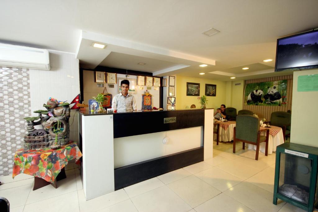 TV a/nebo společenská místnost v ubytování New Hotel Panda
