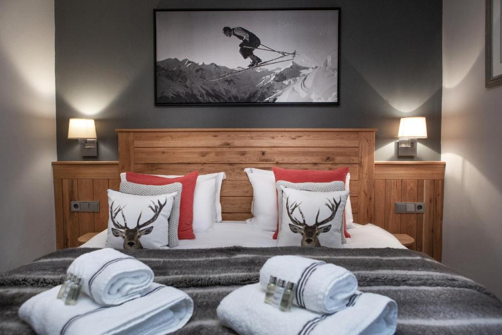 Postel nebo postele na pokoji v ubytování Chalet Zell by Chalet Alp Lux - Summer Card