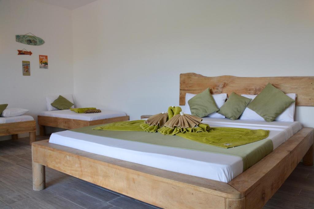 Postel nebo postele na pokoji v ubytování La Base Hotel