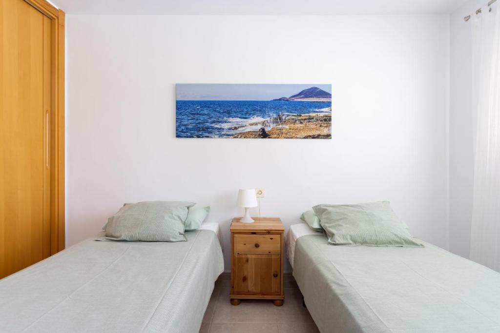 Posteľ alebo postele v izbe v ubytovaní SEA PEARL Holiday Home by Sunkeyrents