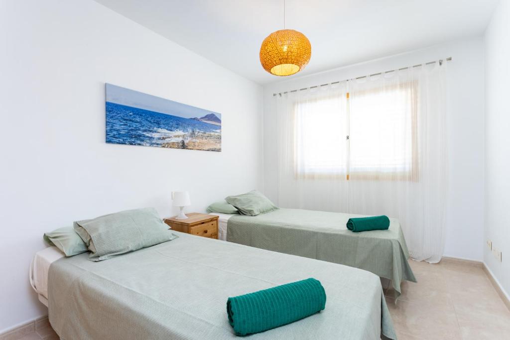 Posteľ alebo postele v izbe v ubytovaní SEA PEARL Holiday Home by Sunkeyrents