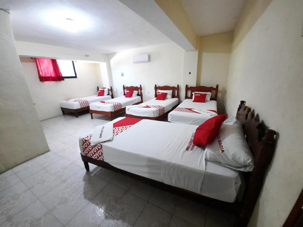 Postel nebo postele na pokoji v ubytování Hotel Costa Maria