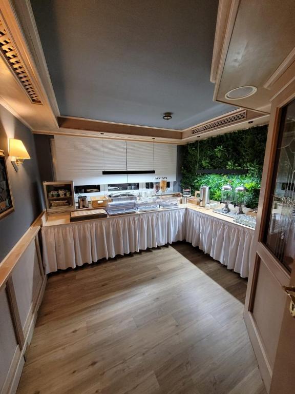 Kuchyň nebo kuchyňský kout v ubytování Ambiente Hotel garni