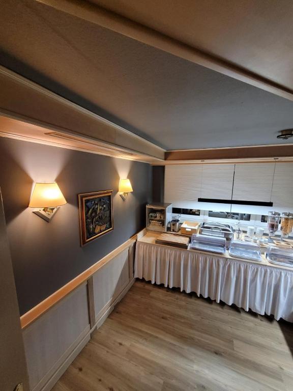 Kuchyň nebo kuchyňský kout v ubytování Ambiente Hotel garni