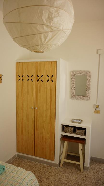 A bed or beds in a room at Sol y Mar Surf Camp