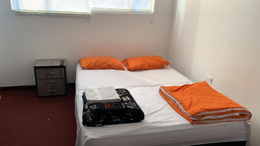 Postel nebo postele na pokoji v ubytování Casa hotel Sports and Family